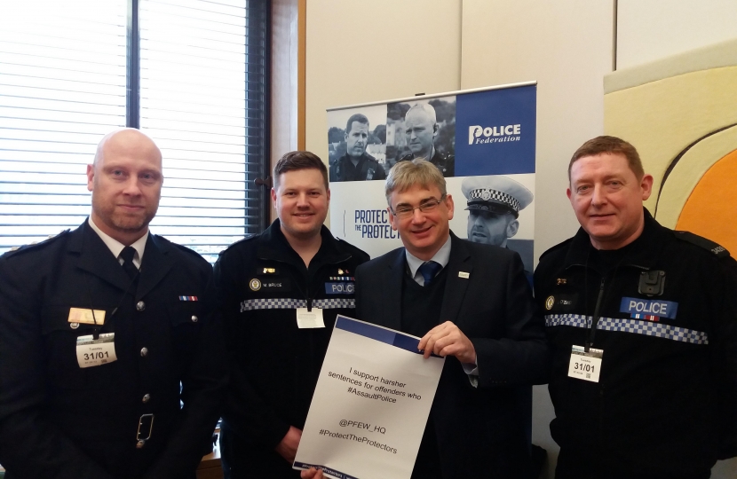 Julian Knight MP with police.