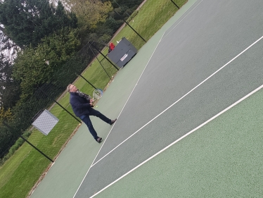 Julian Playing Tennis